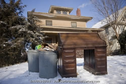An antique rolltop desk waits by the curb for the garbage man to pick it up, winter 2008&ndash;09 in Lincoln, Neb. (Joel Sartore/http://www.joelsartore.com)