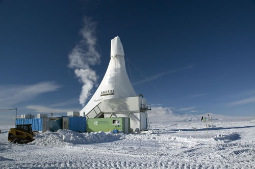 ANDRILL drilling rig in McMurdo Sound, Antarctica, covered by a protective shroud to keep the drill rig and drillers warm. (Photo by Simon Nielsen)
